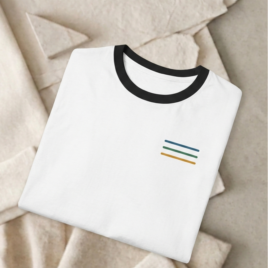 Close-up of horizontal line graphic and ribbed collar on ringer t-shirt