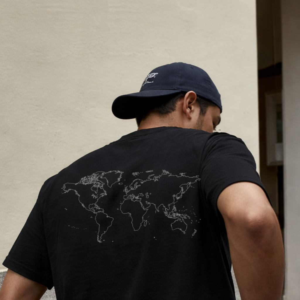 Organic cotton t-shirt featuring a minimalist world map print on the back